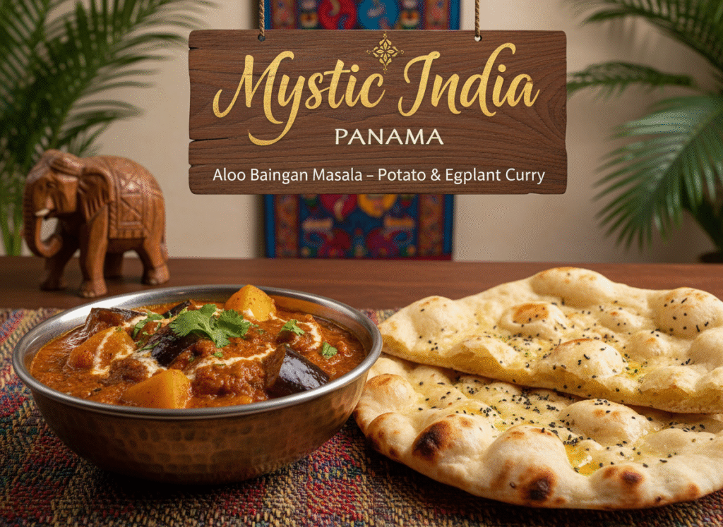 Aloo Baingan Masala served in a traditional bowl with naan at Mystic India Panama