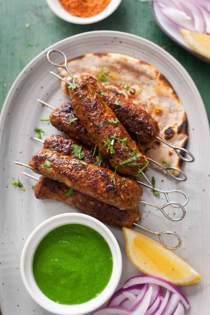 Mutton Sheekh Kebab grilled on skewers with smoky char and Indian spices.
