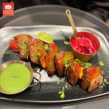 Sea bass tikka grilled with Indian spices at Mystic India Panama.