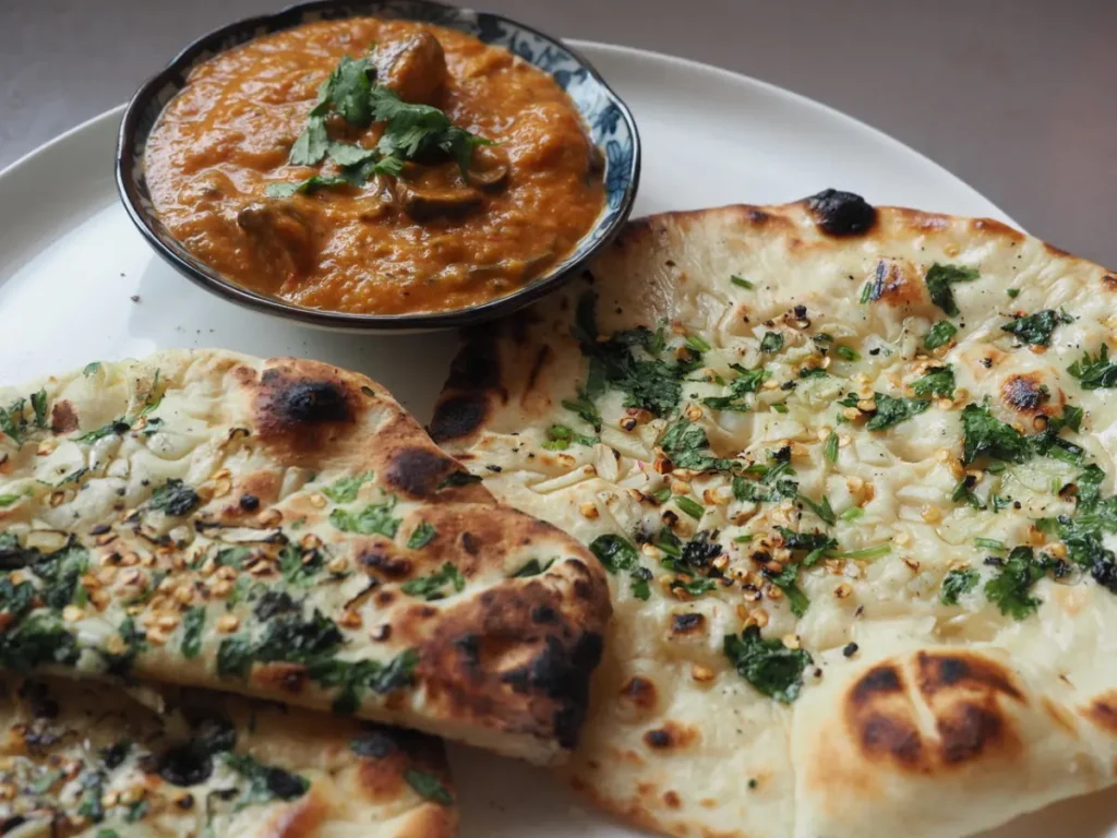 Chilli garlic naan baked in a traditional tandoor with roasted garlic and green chilies.
